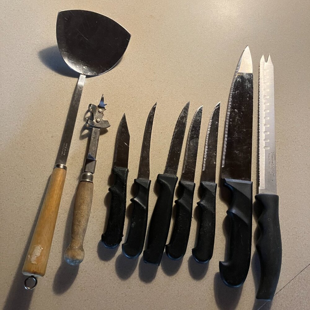 Seven Black Handled Knives With Two Vintage Wood Handled Utensils